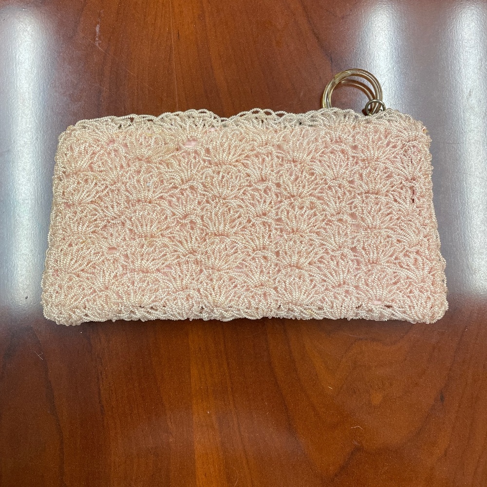 Vintage 1950's very pretty and unique pink clutch with satin lining